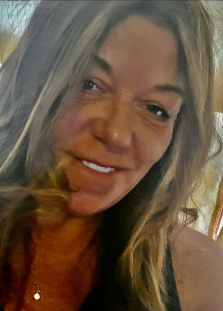 Close-up smiling woman with long hair
